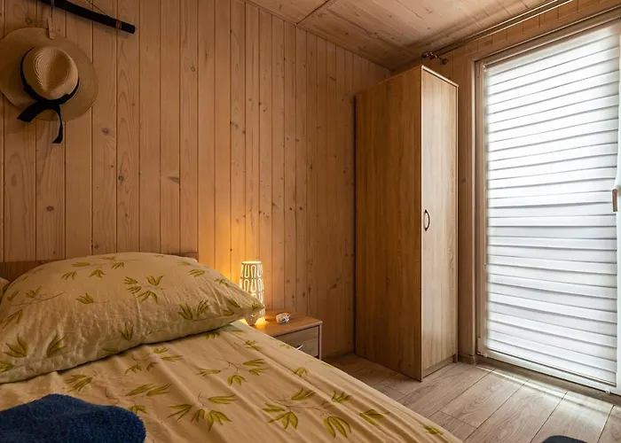 Evita Деревянный коттедж *